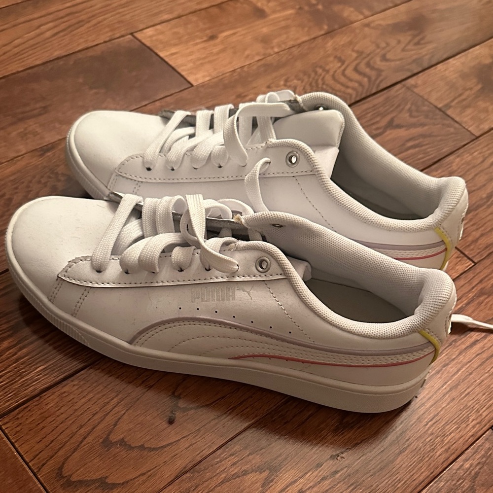 Puma White Sneakers with Subtle Pink and Yellow Details